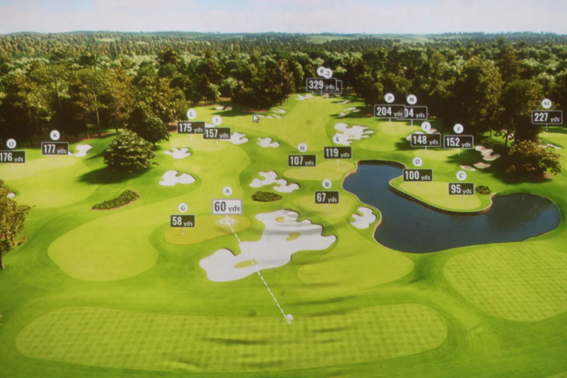 TrackMan aerial yardage view on a simulator screen at Gonzo's HD Sports